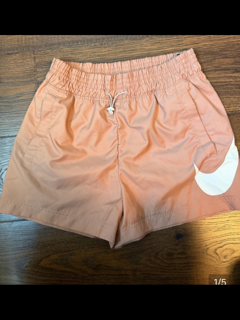 Nike Women's Peach Athletic Shorts with White Swoosh